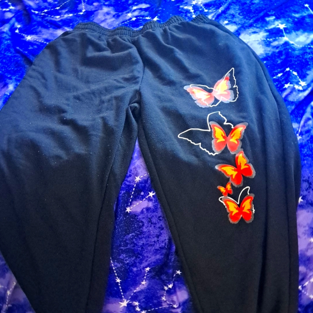 Black butterfly print sweat pants